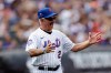 FILE - Former New York Mets' Bobby Valentine, wearing a fake moustache, reacts as he is introduced during an Old-Timers' Day ceremony before a baseball game between the Colorado Rockies and the Mets on Aug. 27, 2022, in New York. (AP Photo/Adam Hunger, File)