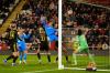 Atletico Madrid's Lauren, center, heads the ball at goal during the Women's Champions League soccer match between Manchester United and Atletico Madrid, Thursday, Feb. 19, 2026, in Leigh, England. (Martin Rickett/PA via AP)