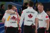 Canada's Brett Gallant, Brad Jacobs, Marc Kennedy and Ben Hebert celebrate defeating Norway in a men's curling semifinal match at the 2026 Winter Olympics, in Cortina d'Ampezzo, Italy, Thursday, Feb. 19, 2026. (AP Photo/Misper Apawu)