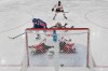United States' Megan Keller (5) scores the winning goal in the women's ice hockey gold medal game between the United States and Canada at the 2026 Winter Olympics, in Milan, Italy, Thursday, Feb. 19, 2026. (Alexander Nemenov/Pool Photo via AP)