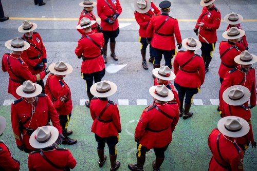 RCMP constables wait to form up for a parade before a Remembrance Day ceremony in Vancouver on Tuesday, Nov. 11, 2025. THE CANADIAN PRESS/Ethan Cairns