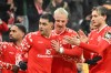 Mainz's Nadiem Amiri, center left, celebrates scoring with teammates during the Bundesliga soccer match between Mainz 05 and Hamburger SV in Mainz, Germany, Friday Feb. 20, 2026. (Torsten Silz/dpa via AP)