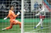 Real Salt Lake's Ariath Piol (19) hits the post as Vancouver Whitecaps goalkeeper Yohei Takaoka (1) watches during the first half of an MLS soccer match in Vancouver, on Saturday, Feb. 21, 2026. THE CANADIAN PRESS/Ethan Cairns