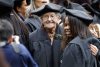 FILE - Hazel Soares, 94, center, gets her picture taken with some of her classmates before the start of commencement exercises at Mills College, in Oakland, Calif., Saturday, May 15, 2010. ( AP Photo/Tony Avelar, File)