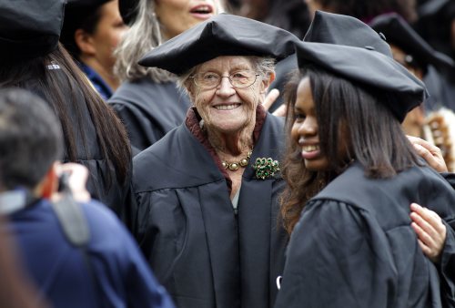 FILE - Hazel Soares, 94, center, gets her picture taken with some of her classmates before the start of commencement exercises at Mills College, in Oakland, Calif., Saturday, May 15, 2010. ( AP Photo/Tony Avelar, File)