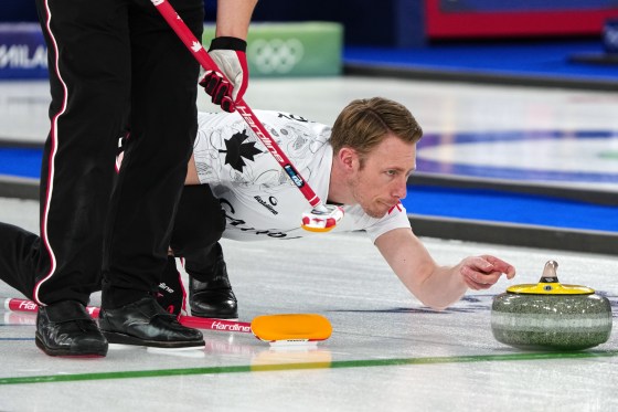Canada's Marc Kennedy used profanity during an in-game discussion with Sweden’s Oskar Eriksson, who felt the Canadians were committing an infraction by ‘double-touching’ curling stones. It snowballed into one of the major buzz stories of the Games. (Misper Apawu / The Associated Press)