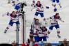 The United States celebrates after a sudden-death overtime goal by United States' Jack Hughes (86) against Canada during the men's ice hockey gold medal game at the 2026 Winter Olympics, in Milan, Italy, Sunday, Feb. 22, 2026. (AP Photo/Luca Bruno)