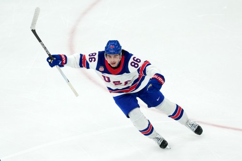 United States' Jack Hughes celebrates after scoring the winning goal against Canada during the overtime period of the men's ice hockey gold medal game at the 2026 Winter Olympics in Milan, Italy, Sunday, Feb. 22, 2026. (AP Photo/Carolyn Kaster)
