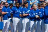 The Toronto Blue Jays line up for the anthems prior to the first Spring Training game against the Philadelphia Phillies in Dunedin, Fla. on Saturday February 21, 2026. THE CANADIAN PRESS/Frank Gunn