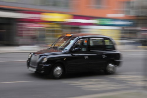 Britain Robotaxis A black cab drives along a street in London, Monday, Feb. 9, 2026. (AP Photo/Kin Cheung)