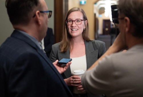 Liberal MP for Burlington Karina Gould speaks with media as she makes her way to a caucus meeting on Monday, March 10, 2025 in Ottawa. THE CANADIAN PRESS/Adrian Wyld