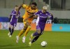 Fiorentina's Dodo, right, and Pisa's Henrik Meister in action during the Serie A soccer match between Pisa and Fiorentina, in Florence, Italy, Monday, Feb. 23, 2026. (Marco Bucco/LaPresse via AP)