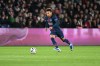 PSG's Desire Doue controls the ball during the French League One soccer match between Paris Saint-Germain and Metz in Paris, France, Saturday, Feb. 21, 2026. (AP Photo/Emma Da Silva)