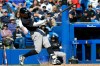 New York Yankees' Aaron Judge connects for a single off Toronto Blue Jays pitcher Jesse Hahn during the fifth inning of a spring training baseball game Tuesday, Feb. 24, 2026, in Dunedin, Fla. (AP Photo/Chris O'Meara)