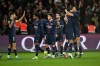 PSG's Goncalo Ramos, right, celebrates with teammates after scoring his side's third goal during the French League One soccer match between Paris Saint-Germain and Metz in Paris, France, Saturday, Feb. 21, 2026. (AP Photo/Emma Da Silva)