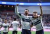Vancouver Whitecaps' Tristan Blackmon, left, and Sebastian Berhalter celebrate Blackmon's goal against Real Salt Lake during the second half of an MLS soccer match, in Vancouver, on Saturday, May 3, 2025. THE CANADIAN PRESS/Darryl Dyck