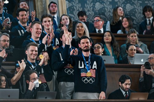 Members of the United States' Olympic gold medal hockey team enter the gallery as President Donald Trump delivers the State of the Union address to a joint session of Congress in the House chamber of the U.S. Capitol in Washington, Tuesday, Feb. 24, 2026. (Kenny Holston/The New York Times via AP, Pool)