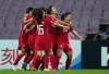 FILE - China's Xiao Yuyi, right, celebrates after scoring a goal during the AFC Women's Asian Cup 2022 final match between China and South Korea in Mumbai, India, Feb. 6, 2022. (AP Photo/Rajanish Kakade, File)