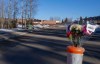 Flowers are placed in a barricade pylon on a road leading to Tumbler Ridge Secondary School in Tumbler Ridge, B.C., on Friday, Feb. 13, 2026. THE CANADIAN PRESS/Christinne Muschi