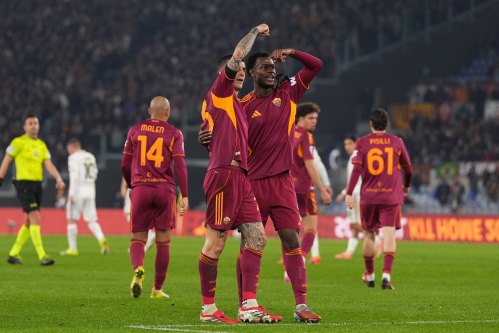 Roma's Evan Ndicka and Roma's Gianluca Mancini celebrates after scoring during the Serie A soccer match between Roma and Cremonese in Rome, Italy, Sunday Feb. 22, 2026. (Alfredo Falcone/LaPresse via AP)