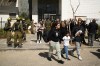 Residents are evacuated from a building hit by a projectile in Tirat Hacarmel, northern Israel, Saturday, Feb. 28, 2026. No injuries were reported. (AP Photo/Leo Correa)