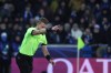 Referee Glenn Nyberg gestures to set a penalty after checking VAR during the Champions League play-off first leg soccer match between Club Brugge and Atletico Madrid, in Bruges, Belgium, Wednesday, Feb. 18, 2026. (AP Photo/Omar Havana)