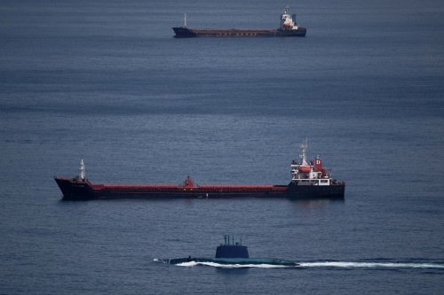 An Israeli submarine is seen in the Haifa Bay , northern Israel, Saturday, Feb. 28, 2026 after Israel issued a nationwide alert following its strikes on Iran.(AP Photo/Leo Correa)