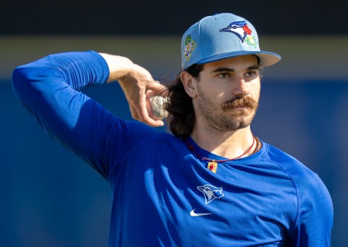 Toronto Blue Jays pitcher Dylan Cease warms up throwing at Spring Training in Dunedin, Fla. on Friday Feb. 20, 2026. THE CANADIAN PRESS/Frank Gunn