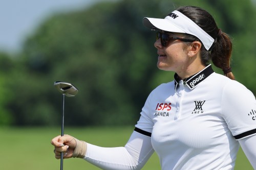 Hannah Green of Australia reacts on the green during the HSBC Women's World Championship at Sentosa Golf Club in Singapore, Sunday, March 1, 2026. (AP Photo/Suhaimi Abdullah)