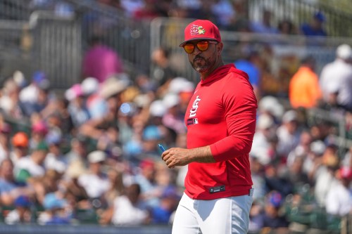 St. Louis Cardinals manager Oliver Marmol walks back from the mound after making a pitching change during the second inning of a spring training baseball game against the New York Mets Friday, Feb. 27, 2026, in Jupiter, Fla. (AP Photo/Jeff Roberson)