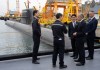 South Korea Prime Minister Kim Min-seok, centre, Prime Minister Mark Carney, second right, and National Defence Minister David McGuinty, right, are given a tour of the Hanwha Ocean Shipyard in Geoje Island, South Korea, Thursday, Oct. 30, 2025. THE CANADIAN PRESS/Adrian Wyld