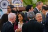 Canadian Finance Minister François-Philippe Champagne, right, and Canadian Foreign Minister Anita Anand, second left, talk to Indian ministers and officials as they wait for the signing of agreement and memorandum of understanding ceremony in New Delhi, India, Monday, March 2, 2026. (AP Photo/Manish Swarup)
