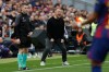 Barcelona's head coach Hansi Flick, center, reacts during the Spanish La Liga soccer match between Barcelona and Villareal in Barcelona, Spain, Saturday, Feb. 28, 2026. (AP Photo/Joan Monfort)