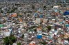 Homes cover a hill in the La Zurza neighbourhood of Santo Domingo, Dominican Republic, Saturday, May 18, 2024. (AP Photo/Matias Delacroix)