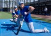 Toronto Blue Jays outfielder Addison Barger (right) and outfielder Nathan Lukes keep an eye on the action during batting practice at spring training in Dunedin, Fla. on Feb. 20, 2026. THE CANADIAN PRESS/Frank Gunn