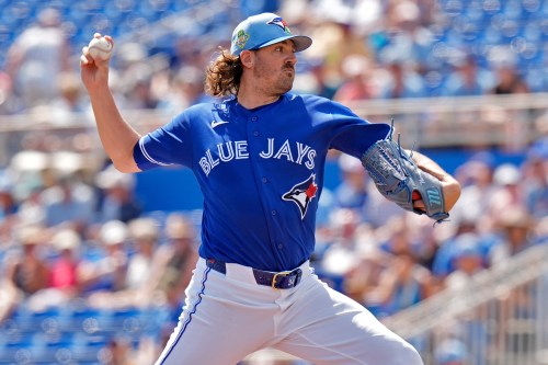 Toronto Blue Jays pitcher Kevin Gausman (34) pitches to Canada during the first inning of an exhibition baseball game Tuesday, March 3, 2026, in Dunedin, Fla. (AP Photo/Chris O'Meara)