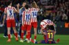 Atletico Madrid's Johnny Cardoso hugs Barcelona's Raphinha after during the Copa del Rey semifinal second leg soccer match between Barcelona and Atletico Madrid in Barcelona, Spain, Tuesday, March 3, 2026. (AP Photo/Joan Monfort)