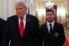 Lionel Messi arrives with President Donald Trump at an event to honor the 2025 Major League Soccer champions Inter Miami CF in the East Room of the White House, Thursday, March 5, 2026, in Washington. (AP Photo/Alex Brandon)