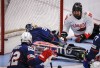 Team USA goalie Jen Lee (32) reaches back as Team Canada forward Dominic Cozzolino (19) scores during first period action in the World Para Ice Hockey Championship final in Calgary, Sunday, May 12, 2024.THE CANADIAN PRESS/Jeff McIntosh