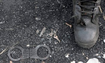 Canadians in Puerto Vallarta, Mexico, are being ordered to shelter in place as violence escalates in the region. Handcuffs, a boot and some keys lay on the ground at the site where a criminal gang ambushed a police convoy near the town of Soyatlan, near Puerto Vallarta, Mexico, Tuesday, April 7, 2015. The fatal attack happened late Monday as the convoy traveled on a rural road between the Pacific coast resort of Puerto Vallarta and Guadalajara, the state capital, the Jalisco state prosecutors' office said. (AP Photo)
