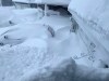 Deep snow is shown in this photo from Feb. 22, 2026, burying cars and front porches in the Kenmount Terrace neighbourhood of St. John's, N.L., after a winter storm.
THE CANADIAN PRESS/Handout-Arathy Roy
(mandatory credit)