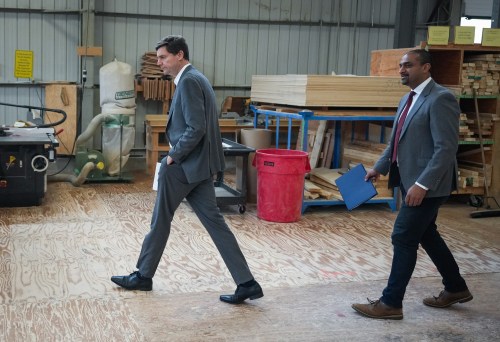 B.C. Premier David Eby, left, and then-Housing Minister Ravi Kahlon arrive for an announcement about digital homebuilding permits at the British Columbia Institute of Technology's carpentry building, in Burnaby, B.C., on Monday, May 27, 2024. THE CANADIAN PRESS/Darryl Dyck