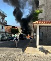 SUPPLIED
Tracey Seida and Jerry Buckland captured this image of smoke and flames from car fires near their vacation rental in Puerto Vallarta, Mexico on Sunday.