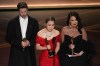 Chris Appelhans, from left, Maggie Kang, and Michelle L.M. Wong accept the award for animated feature film for 