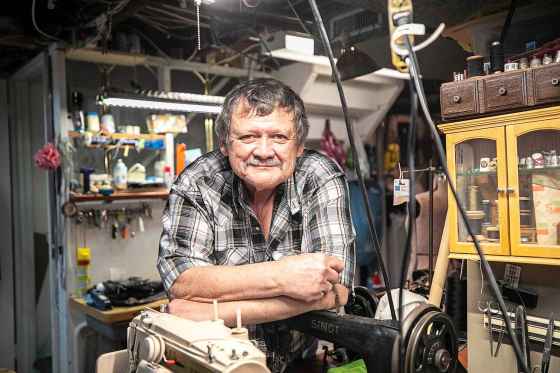 Dave Johnson amid his collection of antique sewing machines. (Mikaela MacKenzie / Free Press)