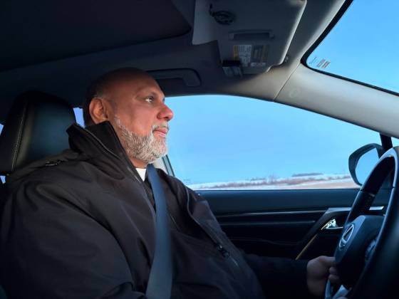 With the sun still low on the horizon, Rev. Malayil begins his drive to Baldur, where he will perform the first of three Sunday masses. (Melissa Martin / Free Press)