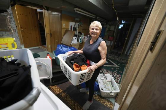 Donna Askew is a volunteer laundress at the Nearly New Shop. (Ruth Bonneville / Free Press)