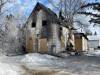 A house in the first 100 block of 8th Street Northwest in Portage la Prairie burned early Sunday morning. (Ruth Bonneville / Free Press)