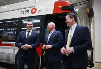 RUTH BONNEVILLE / FREE PRESS
                                From left: Premier Wab Kinew along with former NFI adviser Paul Soubry, and John Sapp, newly appointed president and CEO.