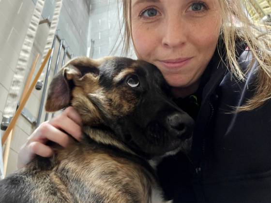 Firefighter paramedic Adrienne Hobbs with four-month-old Sheba. (Supplied)